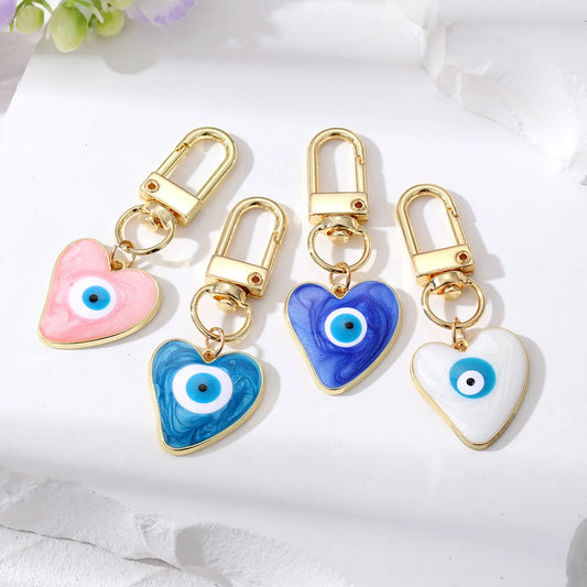 Heart-Shaped Evil Eye Bag Charm with Gold Accents